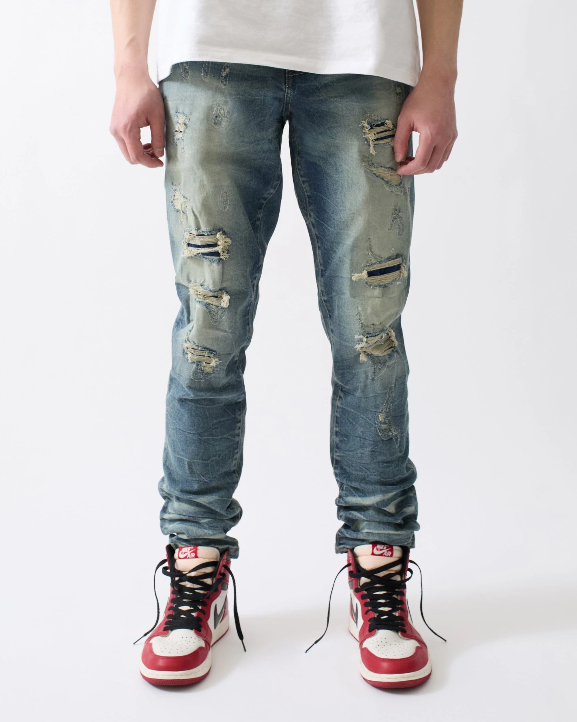 Ripped And Repaired Denim Pants - Blue